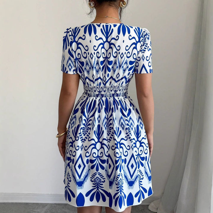 Mini dress for women with a playful A-line cut and floral patterns Lune London