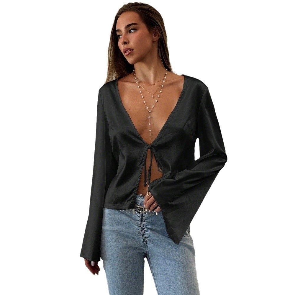 Elegant blouse for women with a deep V neckline and a casual knot detail Chic & Stil