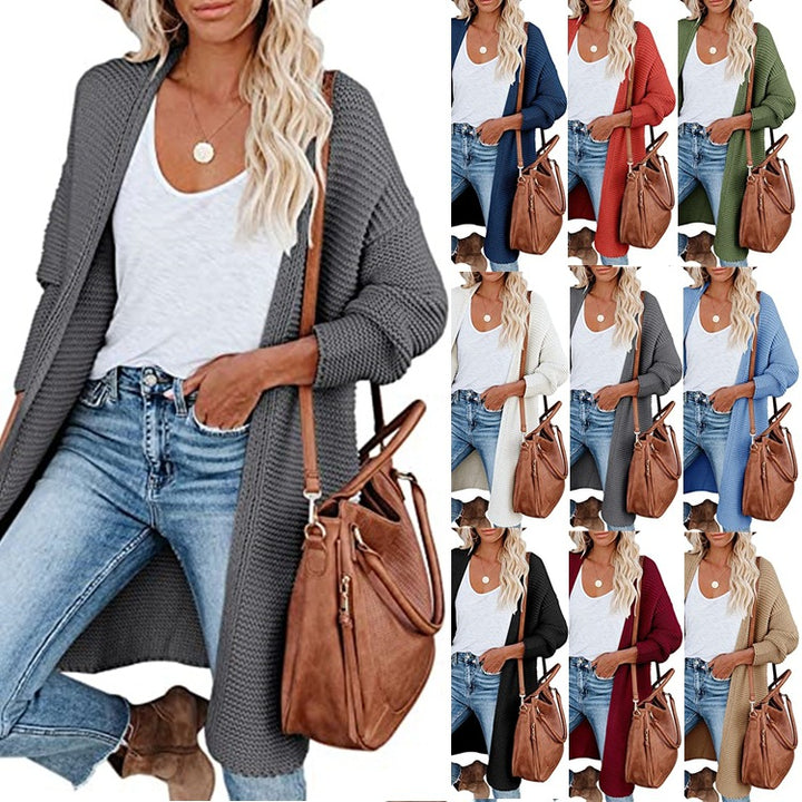 Women Long oversized knit cardigan with deep pockets and textured design Lune London