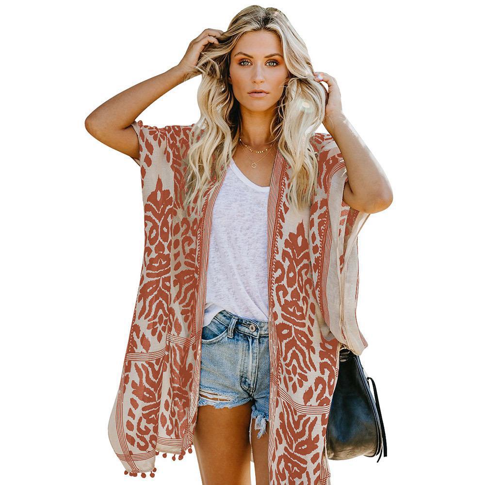 Ladies lightweight kimono cardigan with intricate pattern and fringed hem Lune London