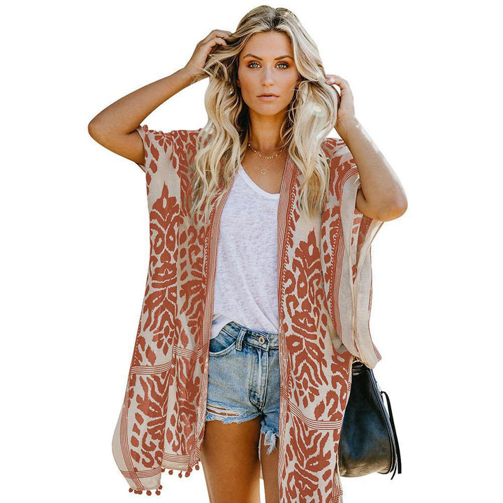 Ladies lightweight kimono cardigan with intricate pattern and fringed hem Lune London