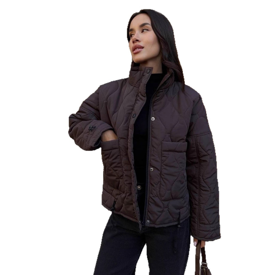 Quilted transitional jacket for women with high collar and drawstring Lune London