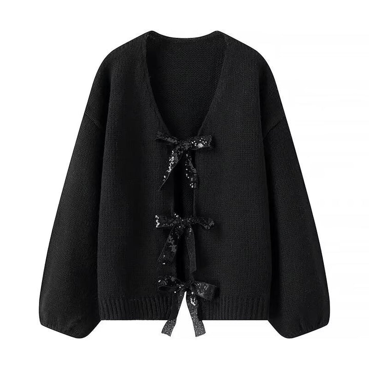 Cardigan en tricot stylé pour femme avec des nœuds glamours sur le bas