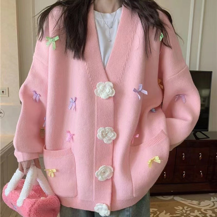 Ladies cardigan with playful flower appliqués and large buttons Lune London