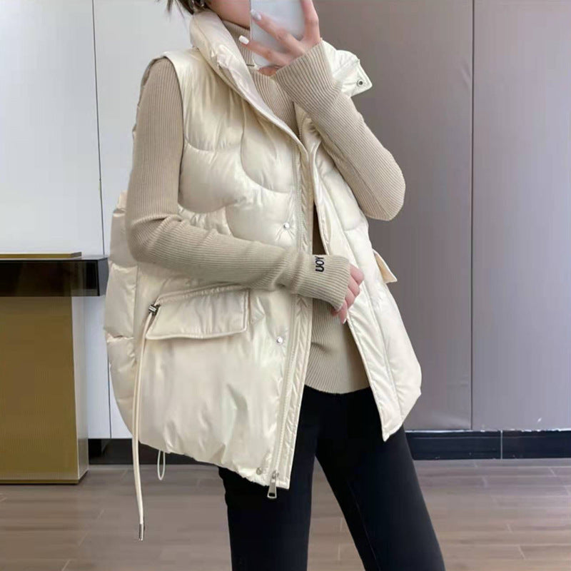Ladies quilted gilet with high collar and zippered pockets on the sides Lune London