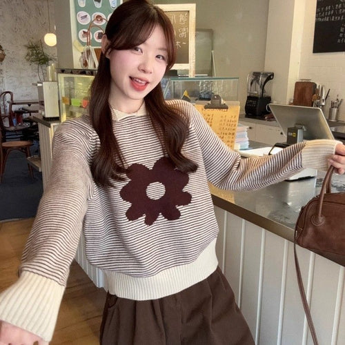 Women's striped sweater with floral appliqué and casual cut