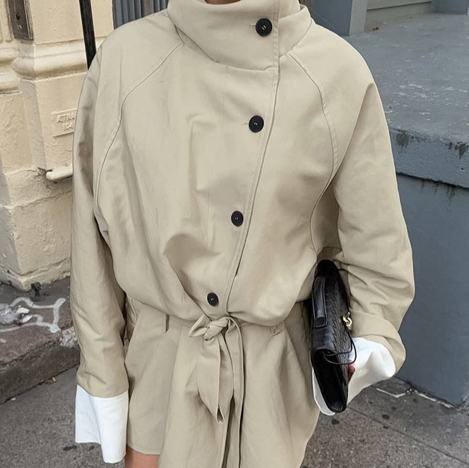 Fashionable oversized trench coat for women with high collar and tie belt Lune London