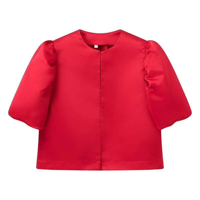 Veste élégante pour femmes avec des manches bouffantes et une coupe courte Chic & Stil