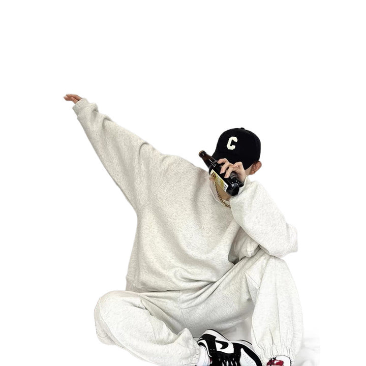 Women's Comfortable Oversized Sweatshirt and Jogger Set with Elastic Waistband and Side Pockets Chic & Stil