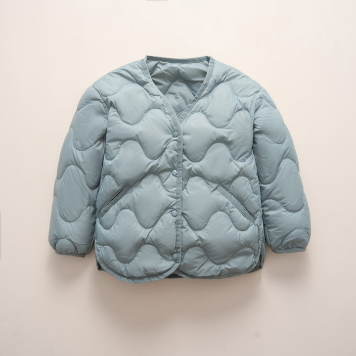 Quilted down jacket for women with modern wave patterns and practical pockets Lune London