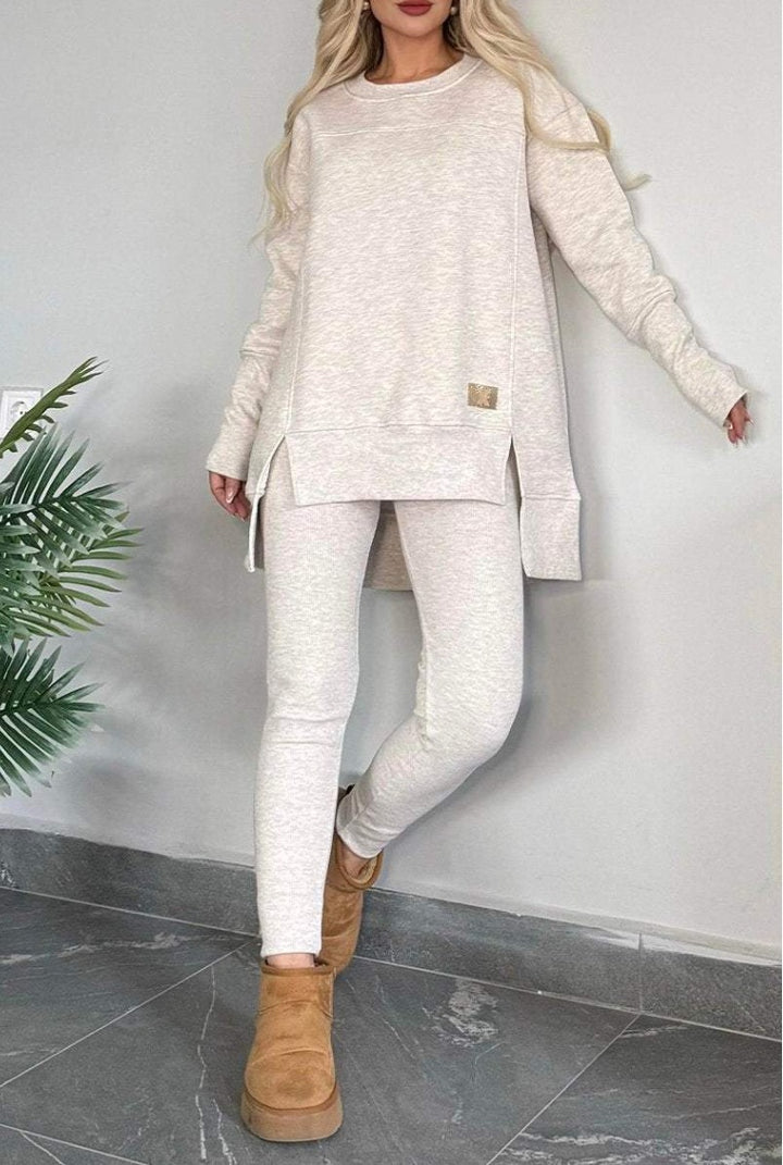 Ladies Casual Long Sleeve Asymmetrical Cut Sweatshirt with Practical Pockets Lune London