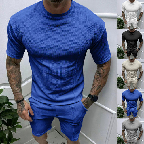Men's short sleeve sports set with an innovative textured design and practical side pockets Lune London