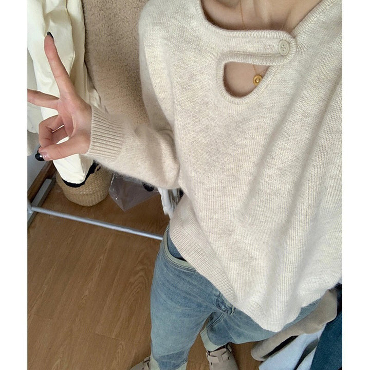 Pull femme avec détail de bouton innovant et coupe décontractée Chic & Stil