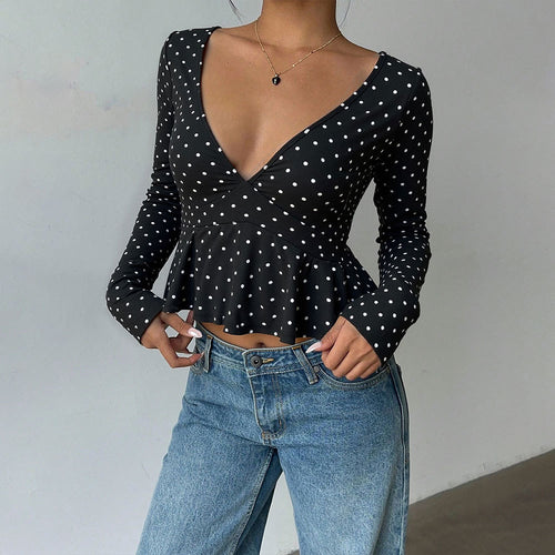 Women's blouse with peplum cut and polka dot pattern Chic & Stil