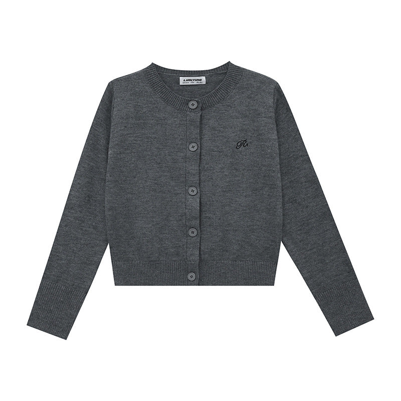 Women's knitted jacket with a fine ribbed pattern and contrasting button details Lune London