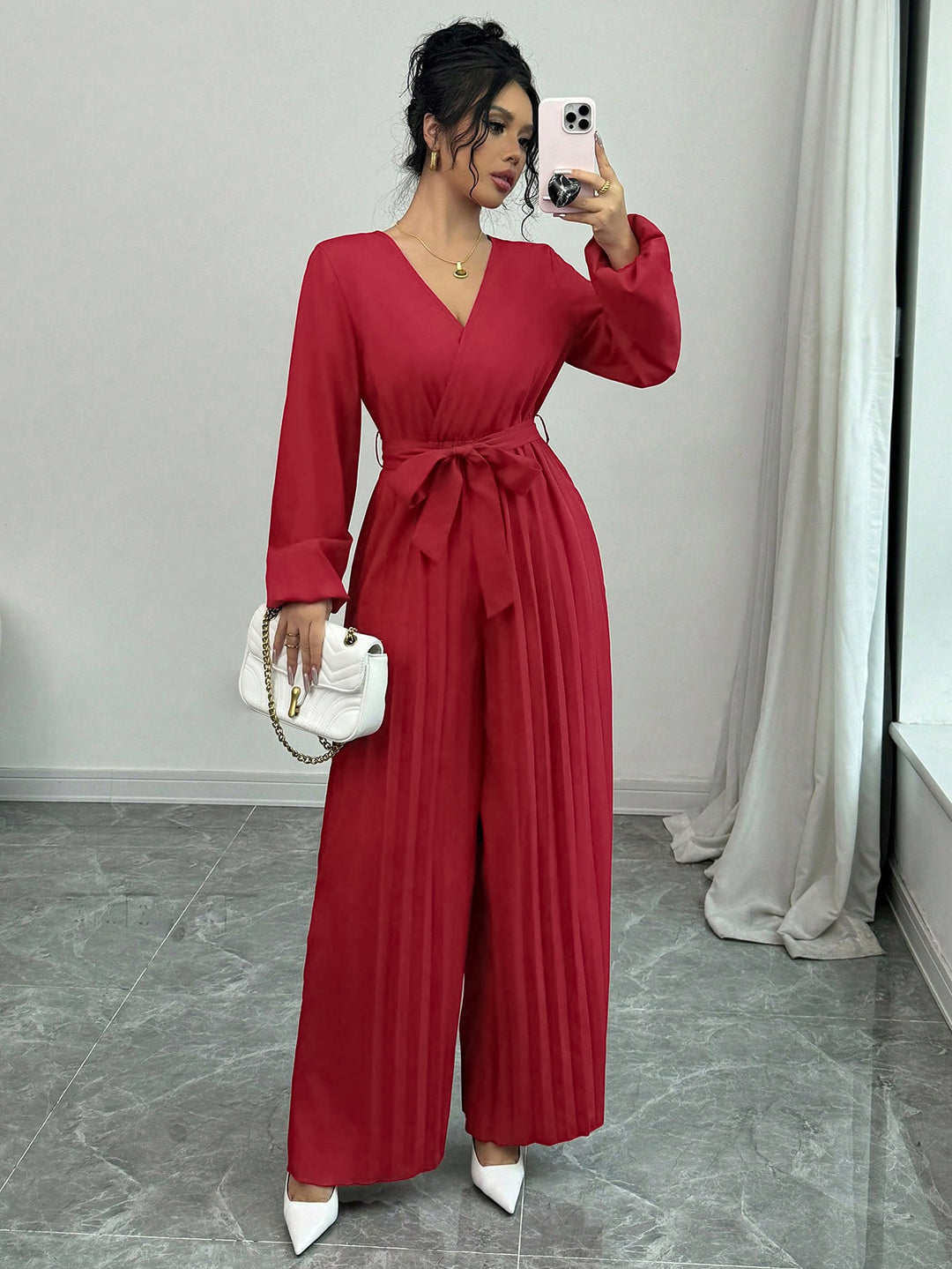 Women’s jumpsuit with pleats and belt Lune London