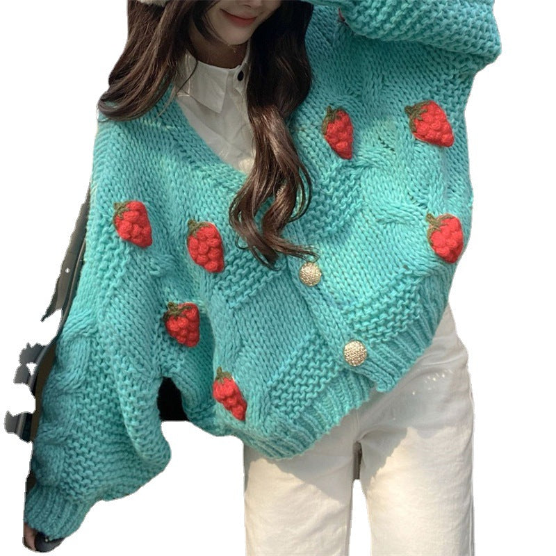Cardigan en maille épaisse pour femmes avec de jolies appliqués de fleurs et des boutons dorés Chic & Stil