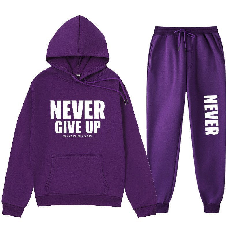 Women's training pullover and jogging pants in motif set with motivating print Chic & Stil