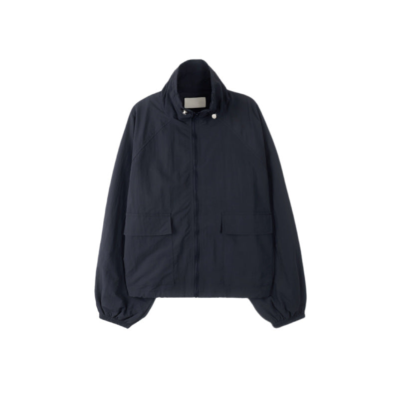 Women's sporty transitional jacket with high collar and practical pockets Chic & Stil