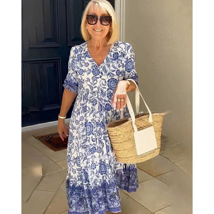 Flared dress with floral patterns for women with pleated waist Lune London