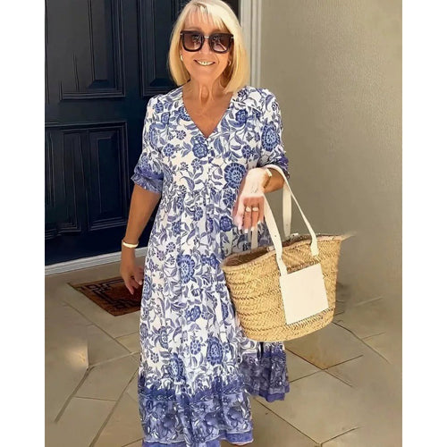 Flared dress with floral patterns for women with pleated waist Lune London