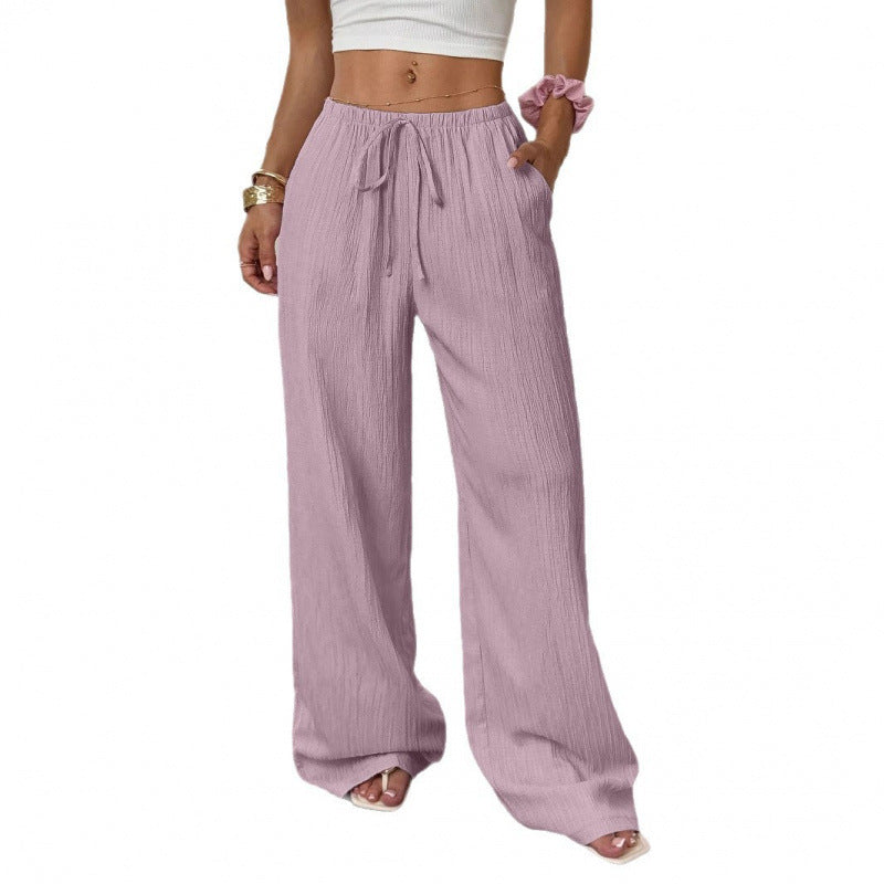 Casual and wide trousers for women with elastic waist and tie belt Lune London