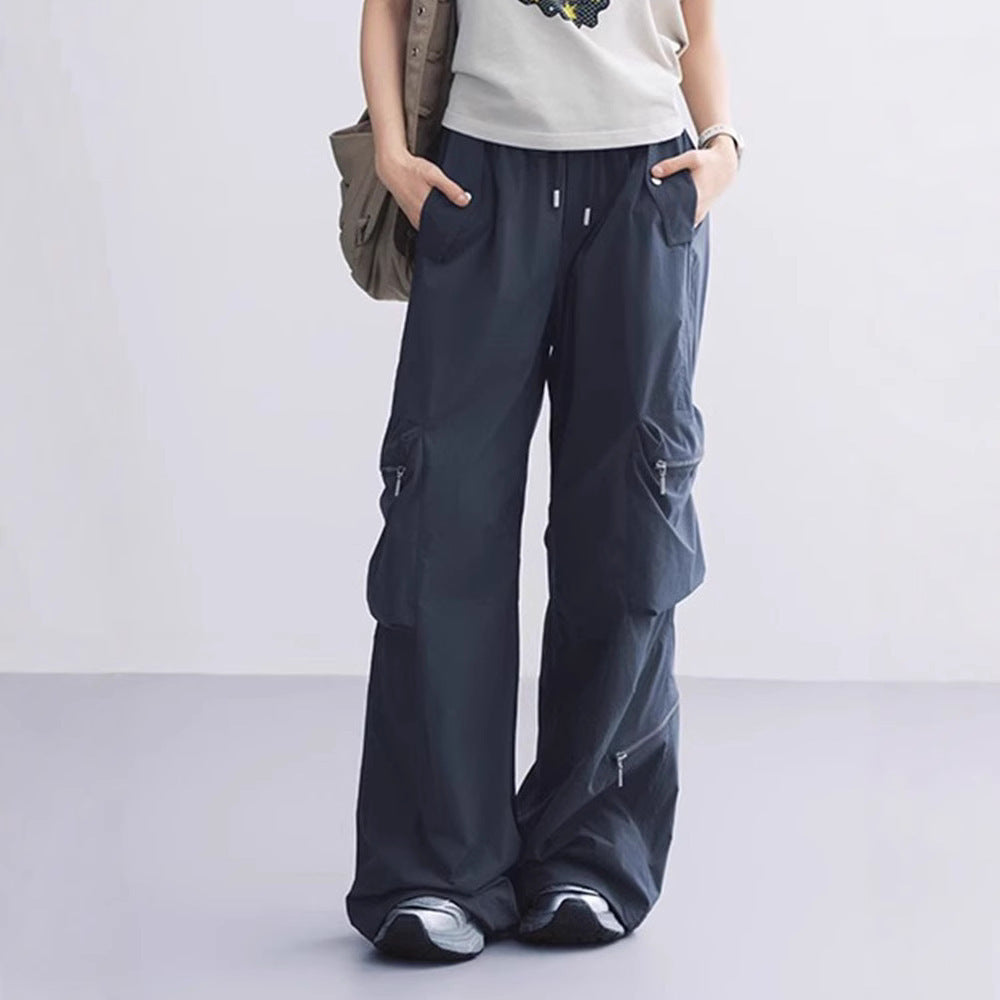 Functional cargo pants for women with elastic waist and practical zip pockets Lune London