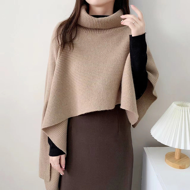 Ladies knitted poncho with high collar and elegant ribbed texture Lune London