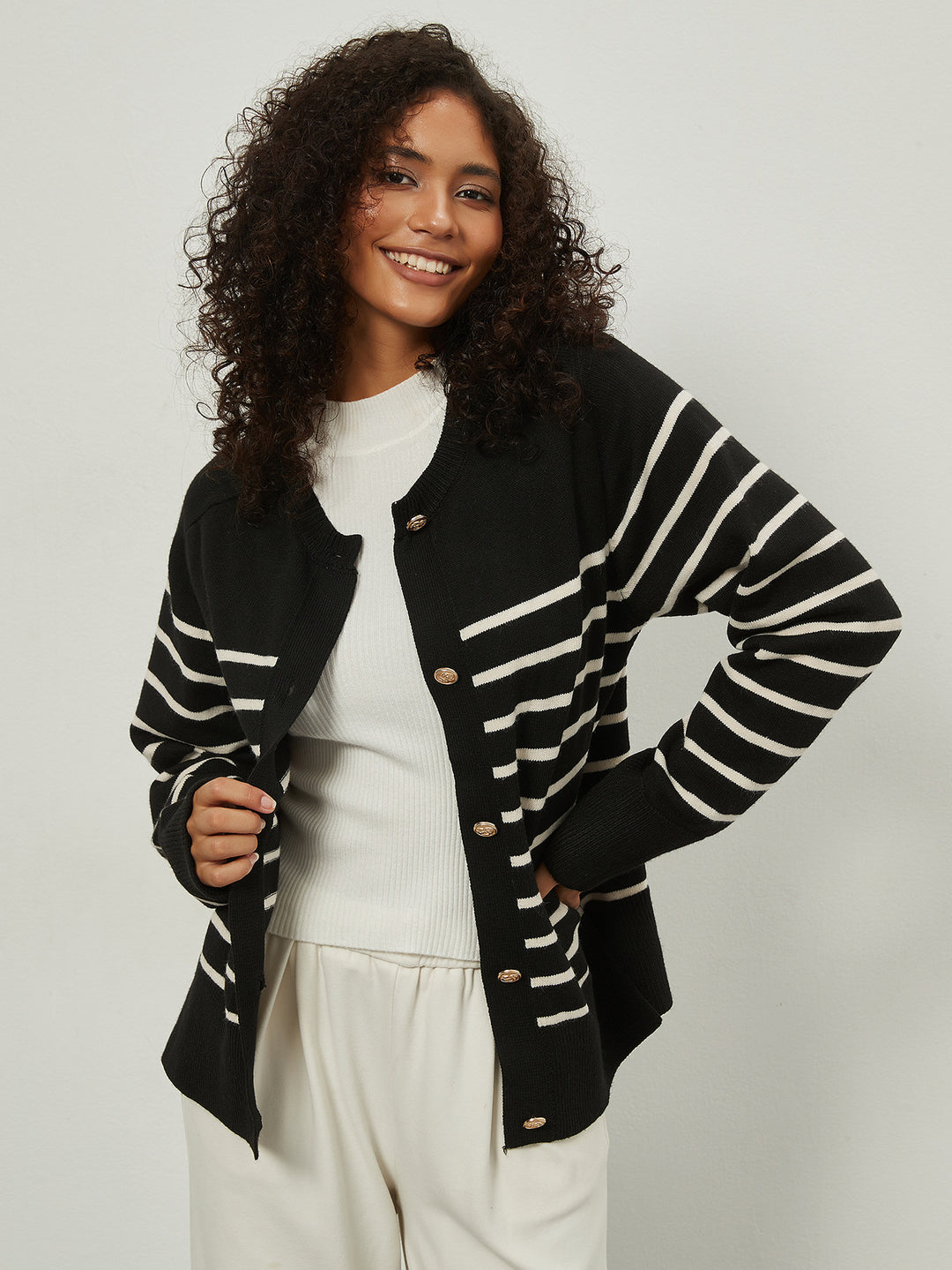Women’s sweater with striped pattern and elegant button details Lune London