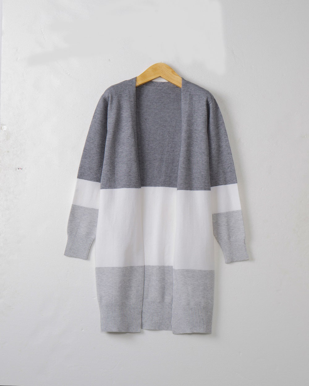 Ladies casual knitted vest with a modern striped pattern and open front Lune London