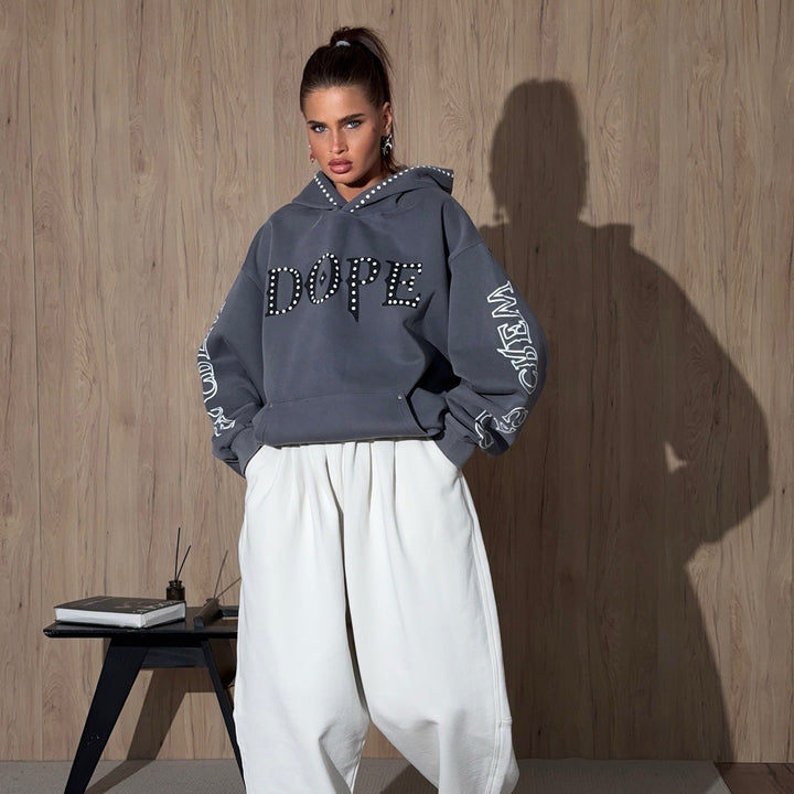 Ladies oversized hoodie with striking stone decoration and creative prints on the sleeves Lune London