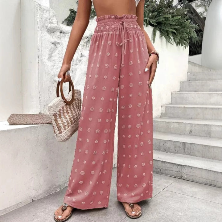 Wide palazzo pants for women with elastic waistband and decorative pattern Lune London