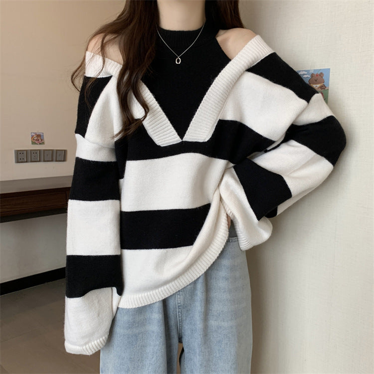 Ladies Oversized V-neck Pullover with trendy striped pattern and open shoulder design Lune London