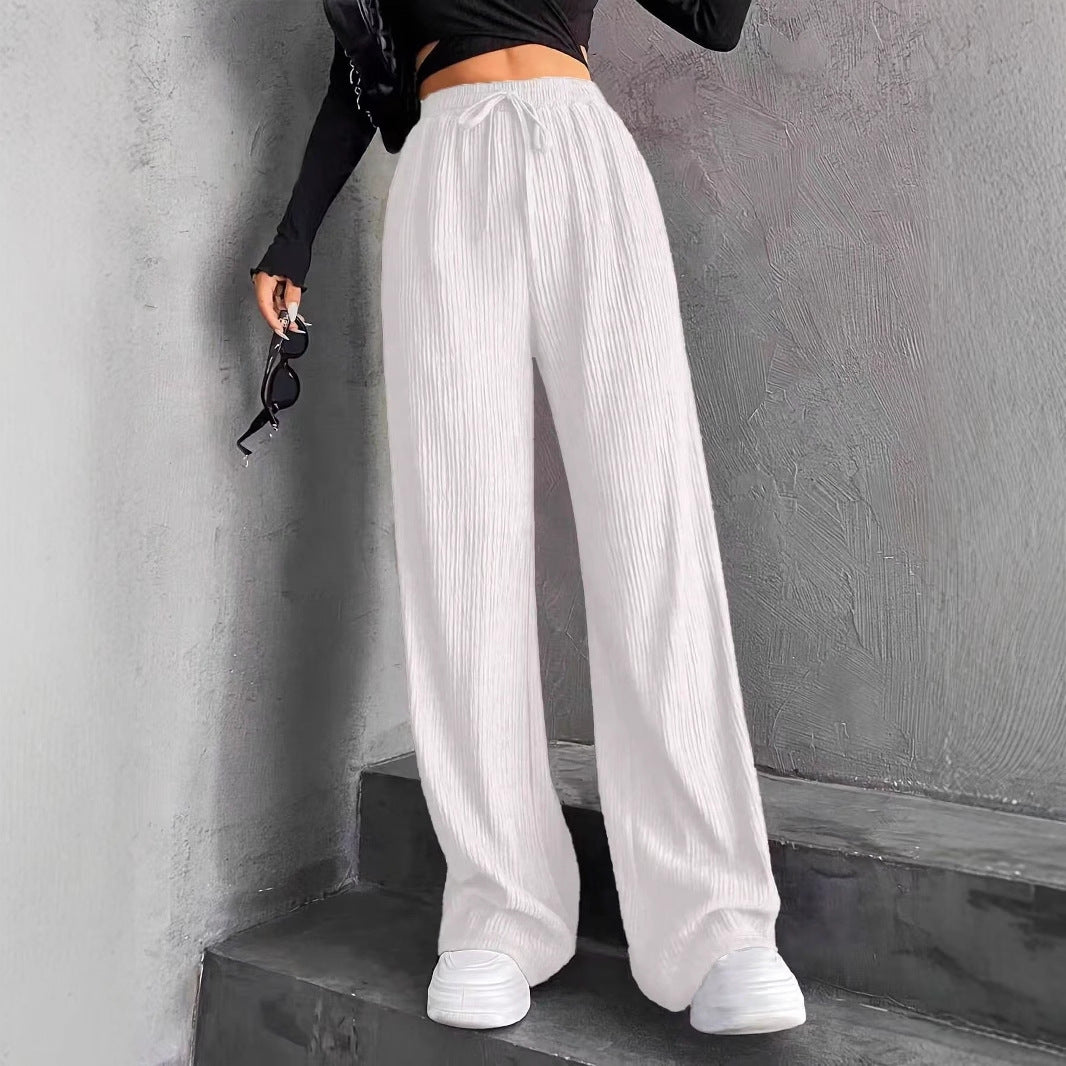 Wide pleated pants for women with elastic waistband and practical pockets Lune London
