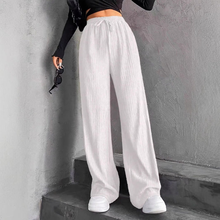 Wide pleated pants for women with elastic waistband and practical pockets Lune London