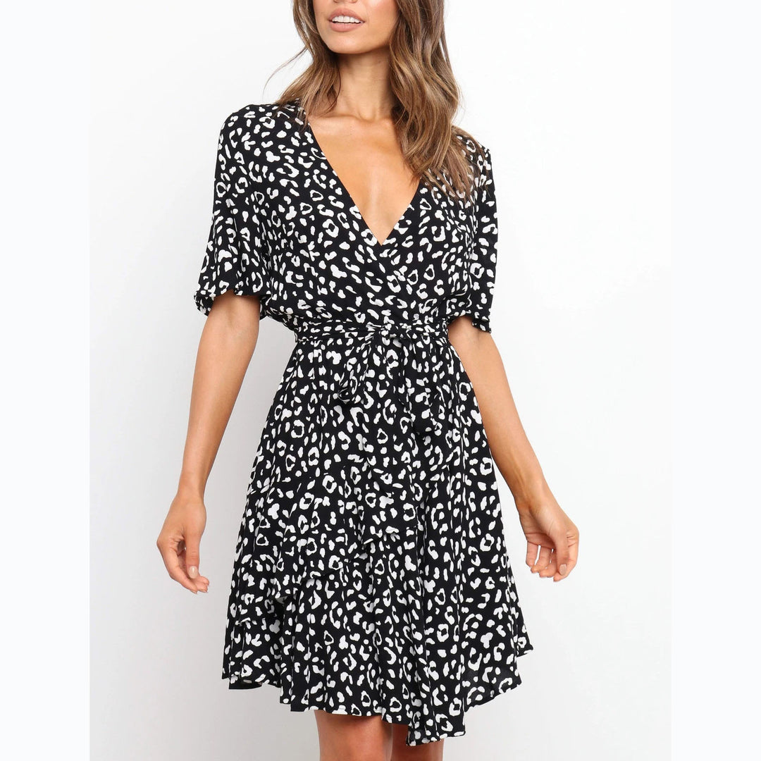 Women's wrap dress with generous ruffle sleeves and beautiful animal print Lune London