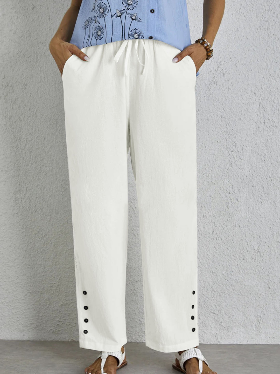 Oversized summer pants for women with elastic waistband and side button details Lune London