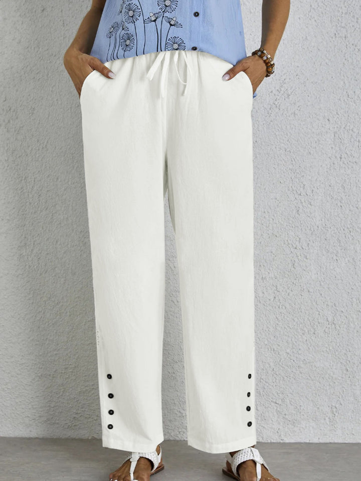 Oversized summer pants for women with elastic waistband and side button details Lune London