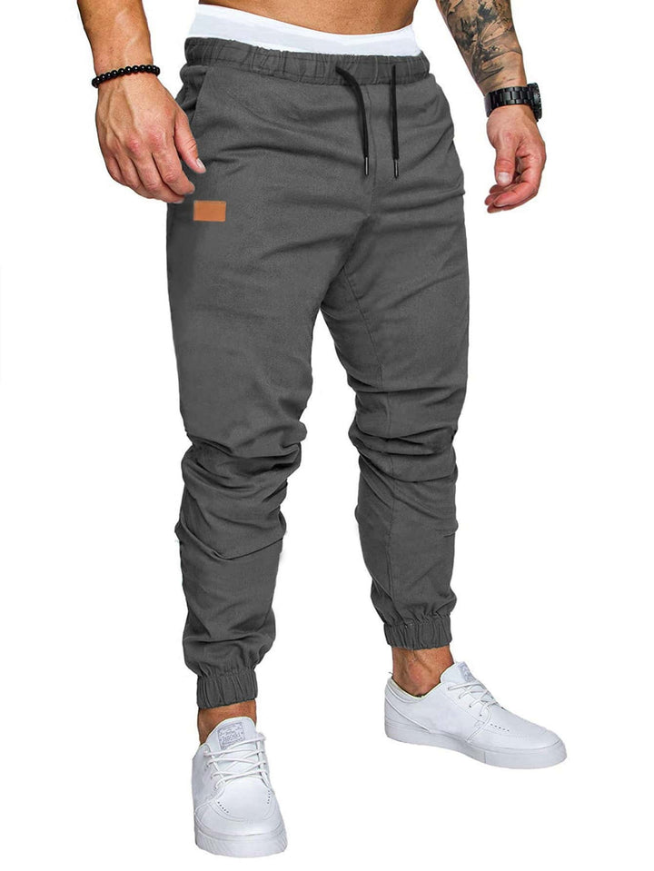 Casual men's jogging pants with elastic waistband and practical zipped pockets Lune London