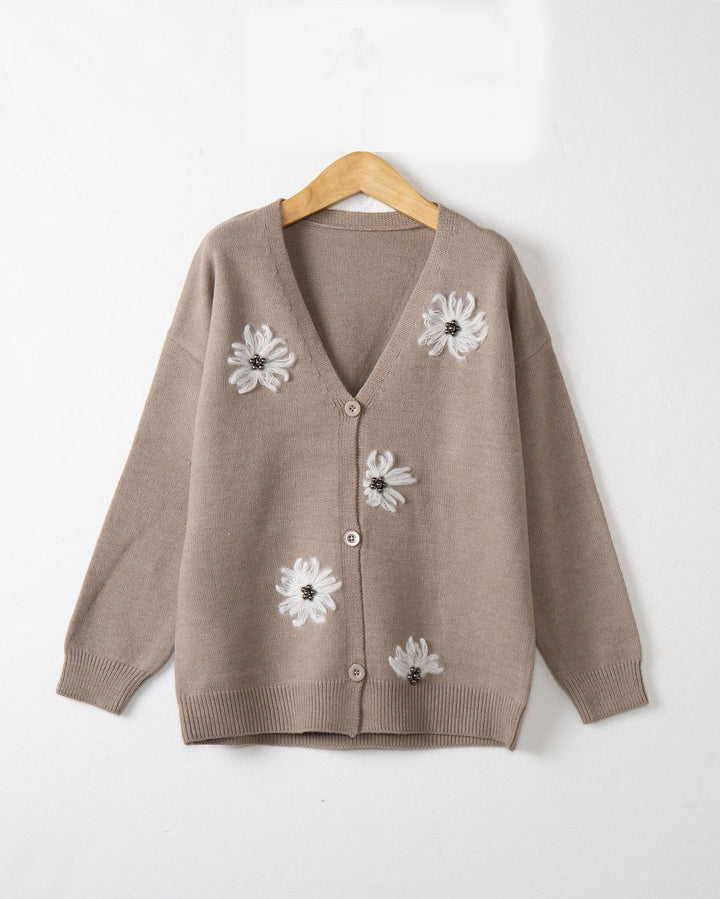 Women’s knitted jacket with floral pattern and elegant button placket Lune London
