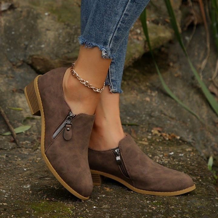 Trendy ankle boots for women with a chic zipper design Lune London