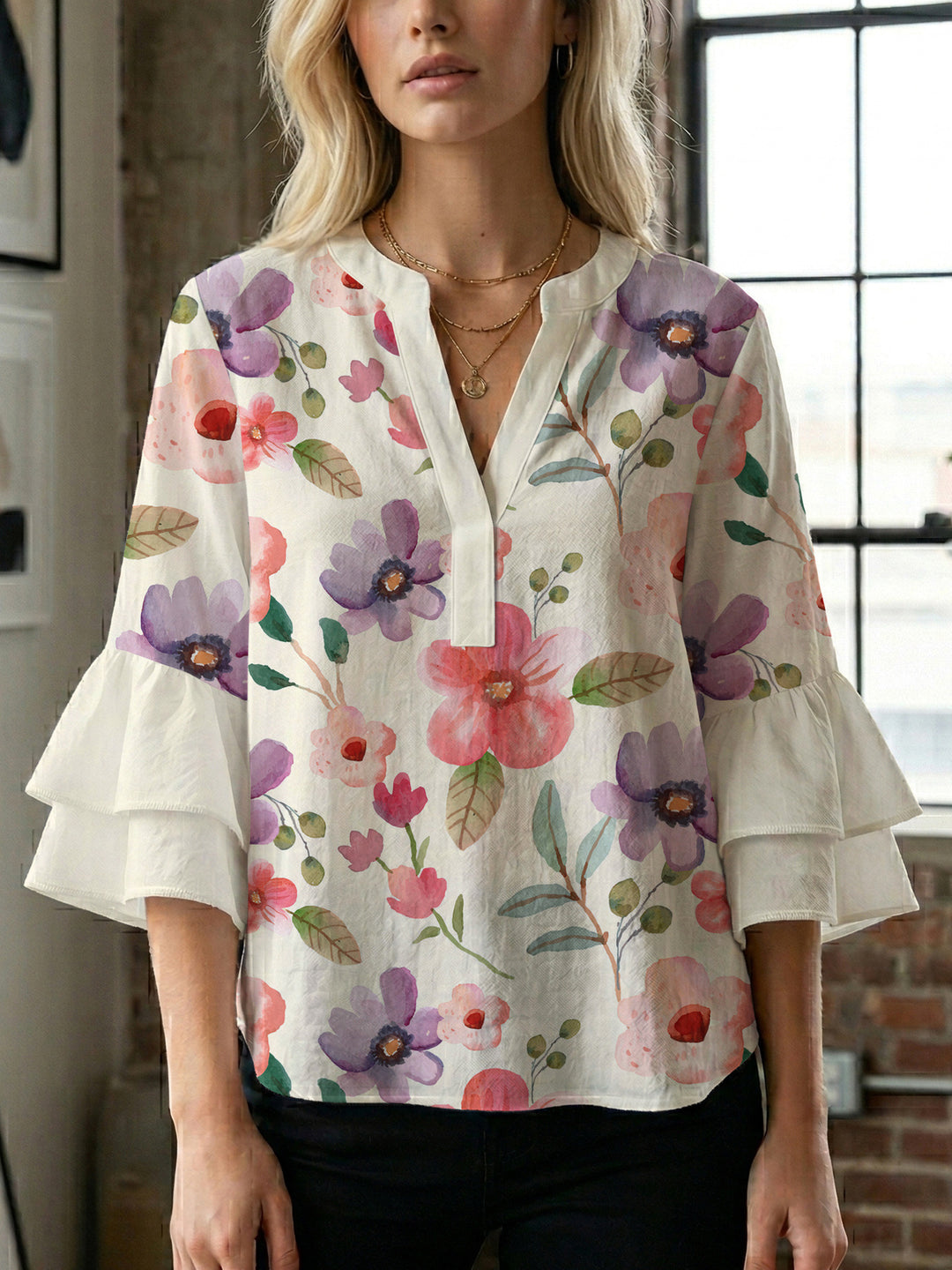Ladies elegant top with voluminous ruffle hems and floral design Lune London