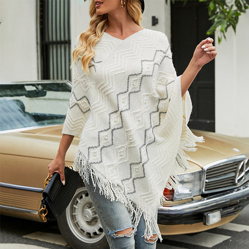 Lune London Elegant poncho for women with a striking textured pattern and decorative fringes