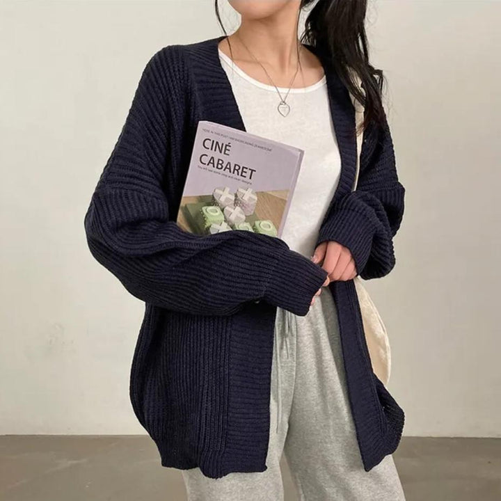 Plus size knitted jacket for women with wide sleeves and a structured texture Lune London