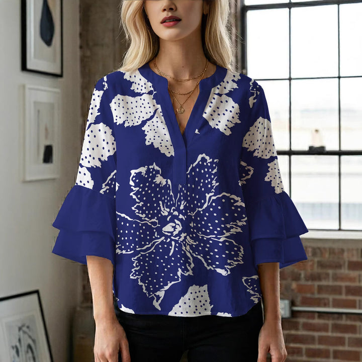 Ladies elegant blouse shirt with voluminous puff sleeves and graphic floral design Lune London