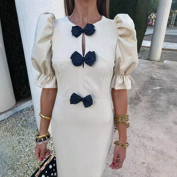 Ladies Elegant Maxi Dress with Unique Bow Detail and Puff Sleeve Design Lune London
