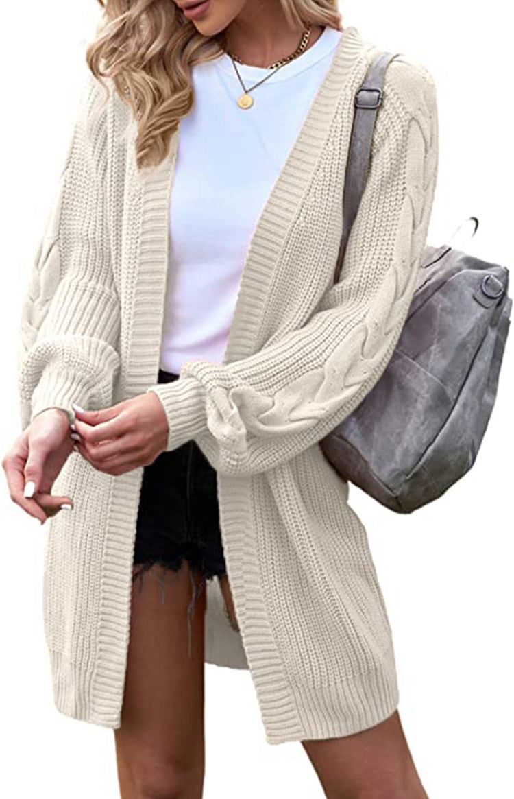 Cardigan knitted for women with voluminous sleeves and cable knit details Lune London