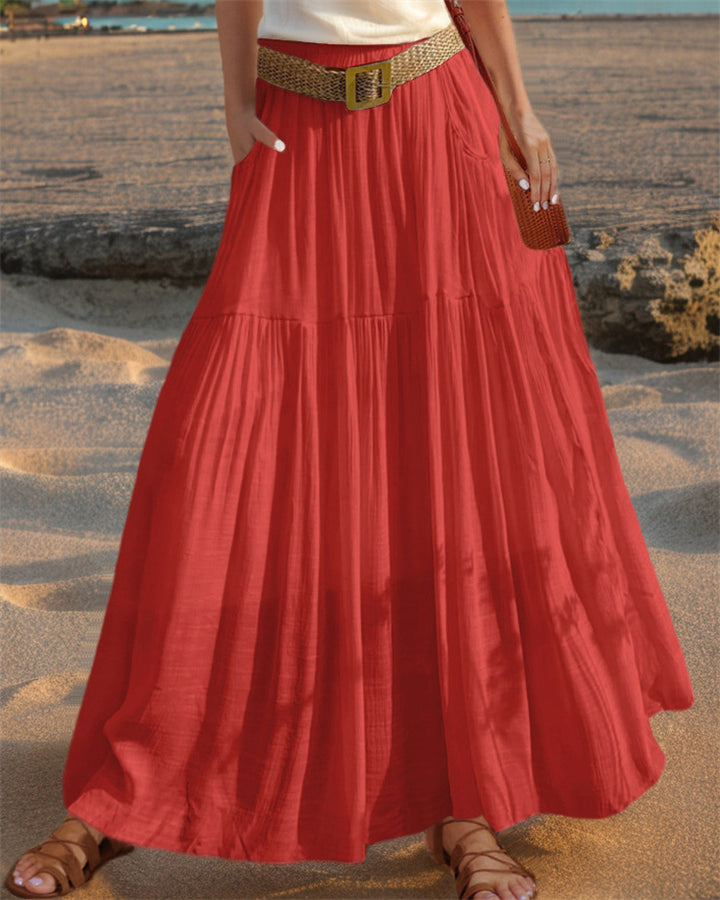 Maxi flared skirt for women with elegant pleated draping and practical pockets Lune London