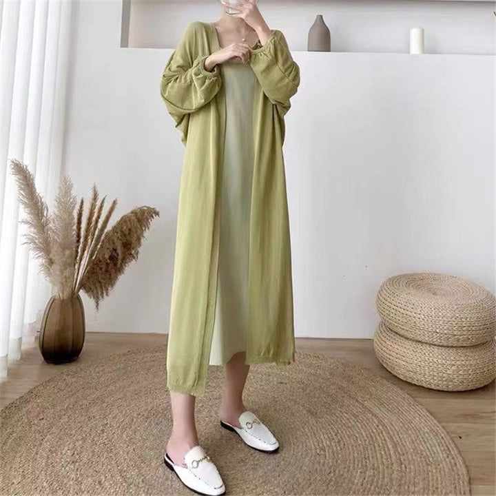 Cardigan long élégant pour femmes avec des manches en forme de ballon et un devant ouvert Chic & Stil