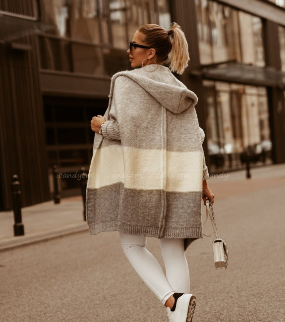 Women knitted poncho with hood and modern color block design Lune London